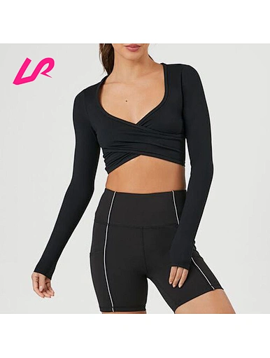 Our black crossover crop top is the perfect balance of style and comfort. Made from high-quality materials, it's perfect for any occasion. Shop now and elevate your wardrobe.